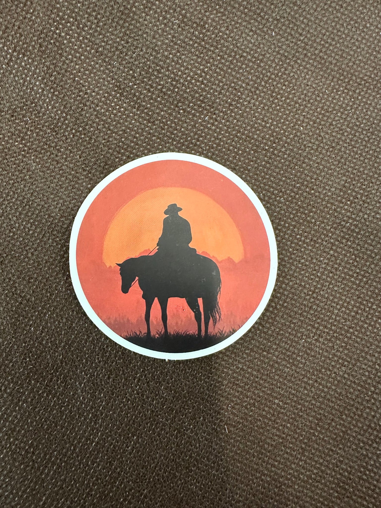 Round Sunset Cowboy Sticker