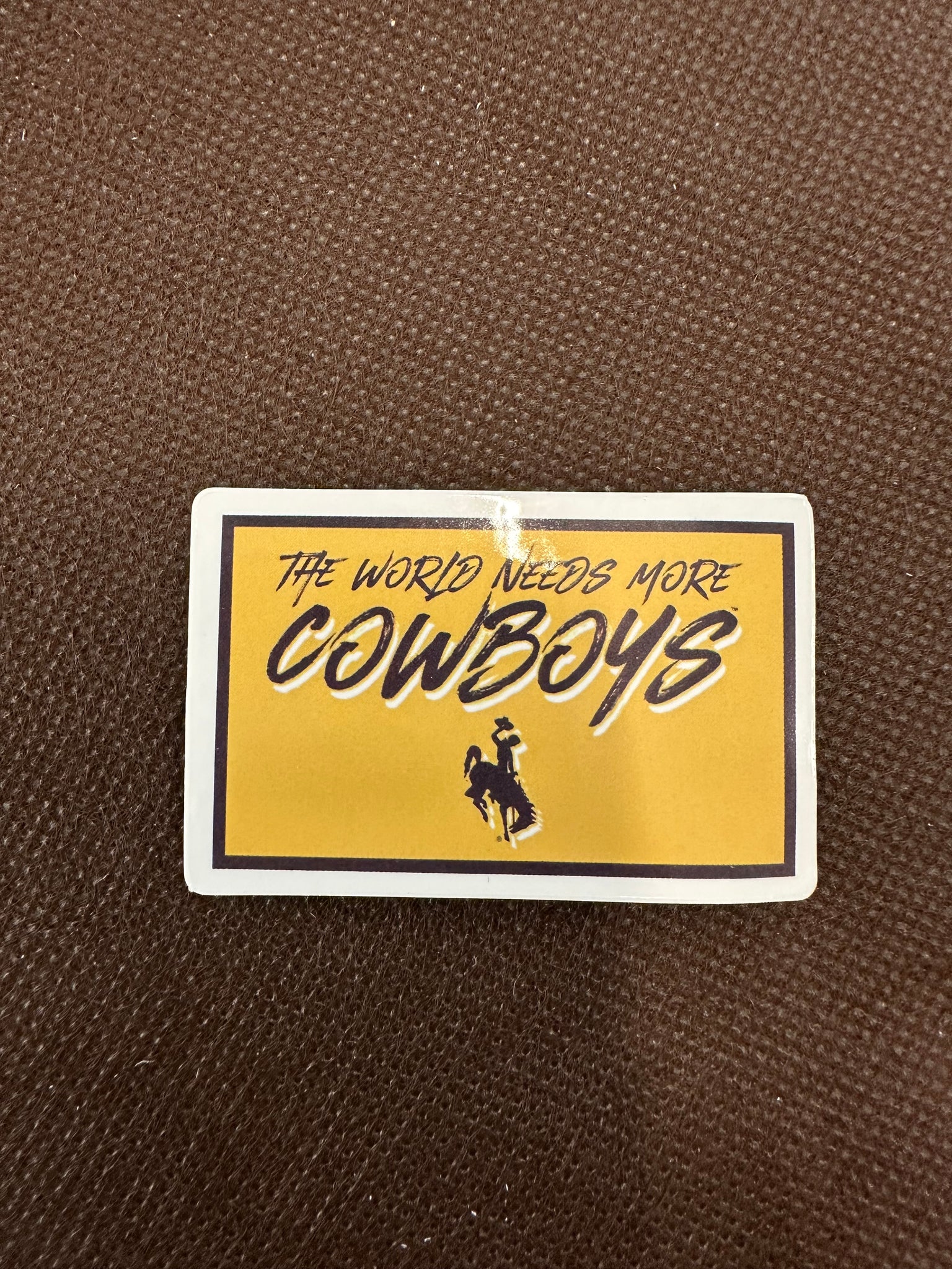 Needs More Cowboys Landscape Sticker